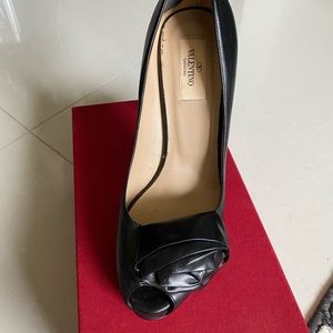 Valentino Garavani 38 1/2 heels.